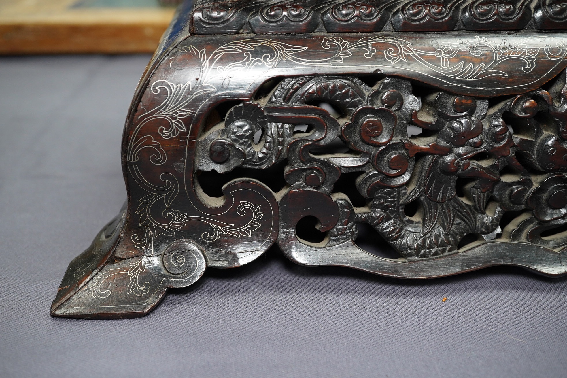 An important pair of Chinese carved zitan and silver wire inlaid ‘cloud and dragon’ curio cabinets and stands, duobaoge, probably Imperial, late Qing dynasty